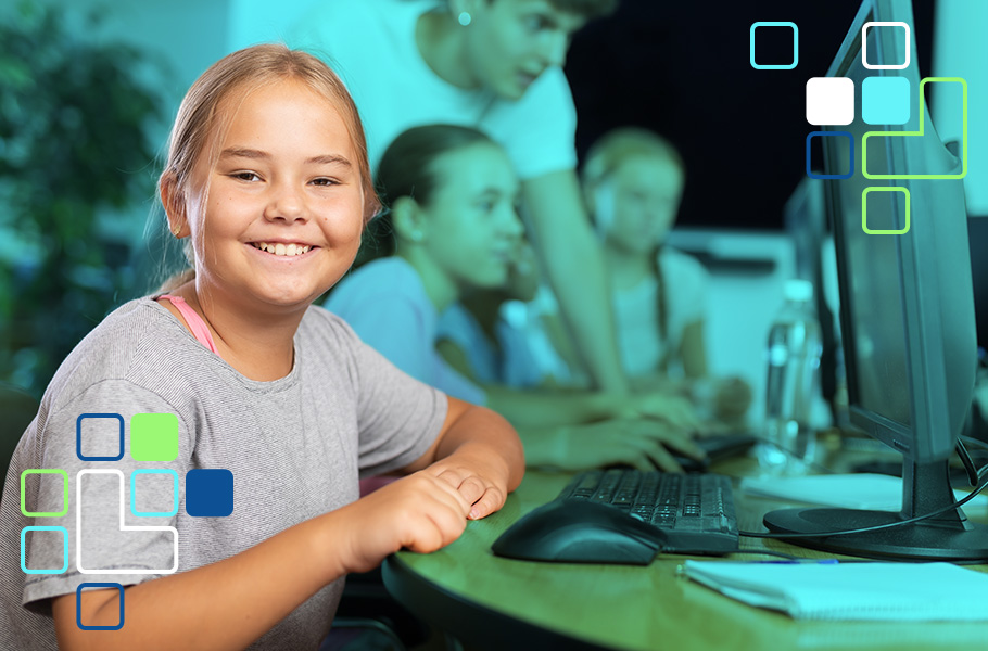 A girl working on a desktop computer