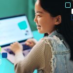 A girl working on a laptop